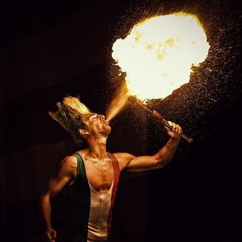 Fire breather demonstrating that your course should entertain